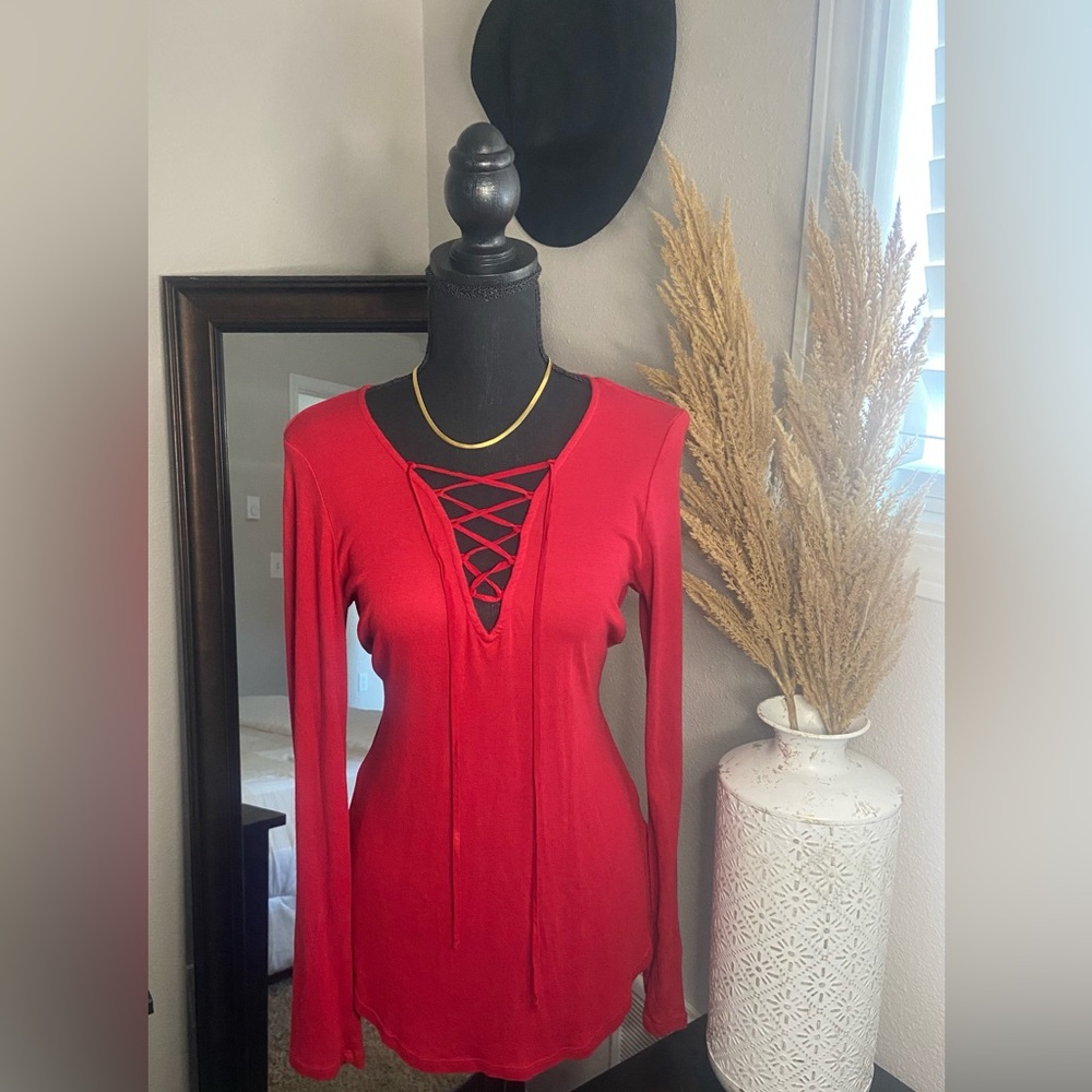 Red long sleeve with cross strings